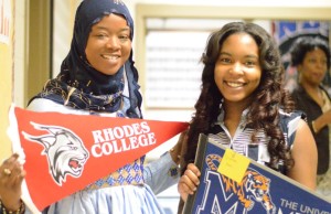 From left: Fatimata Deme and Djeynaba Anne proudly show off their college choices during Academic Signing Day at Whitehaven High School in Memphis. ( Photo by Micaela Watts )